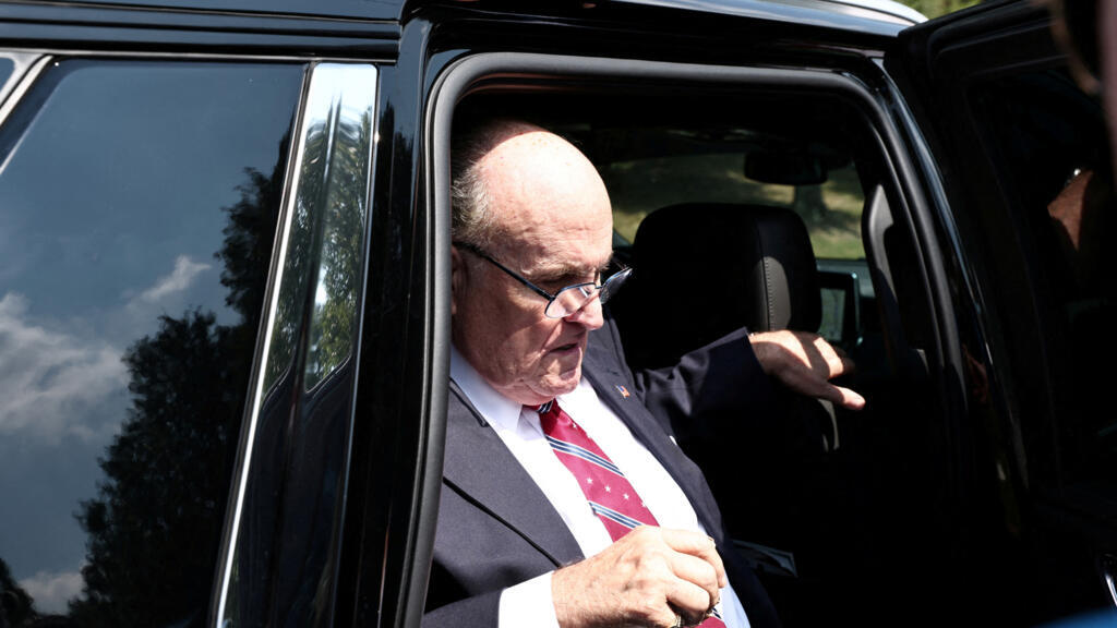 Giuliani surrenders at Georgia jail in Trump election subversion case